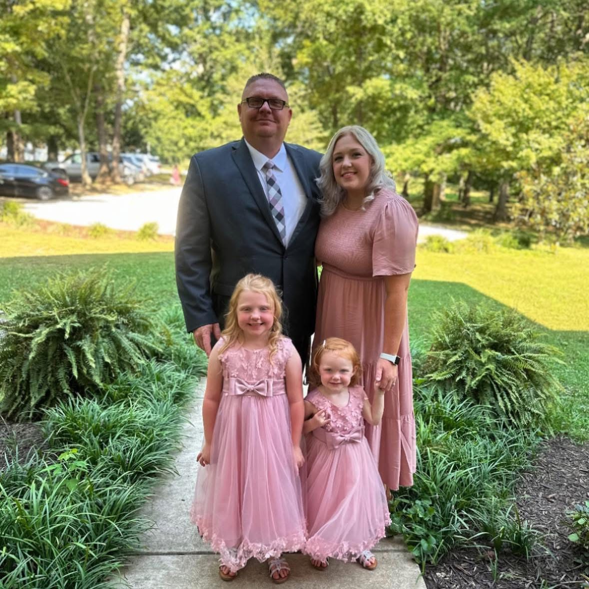 Pastor Jason Coffelt with his wife Talya and their two daughters